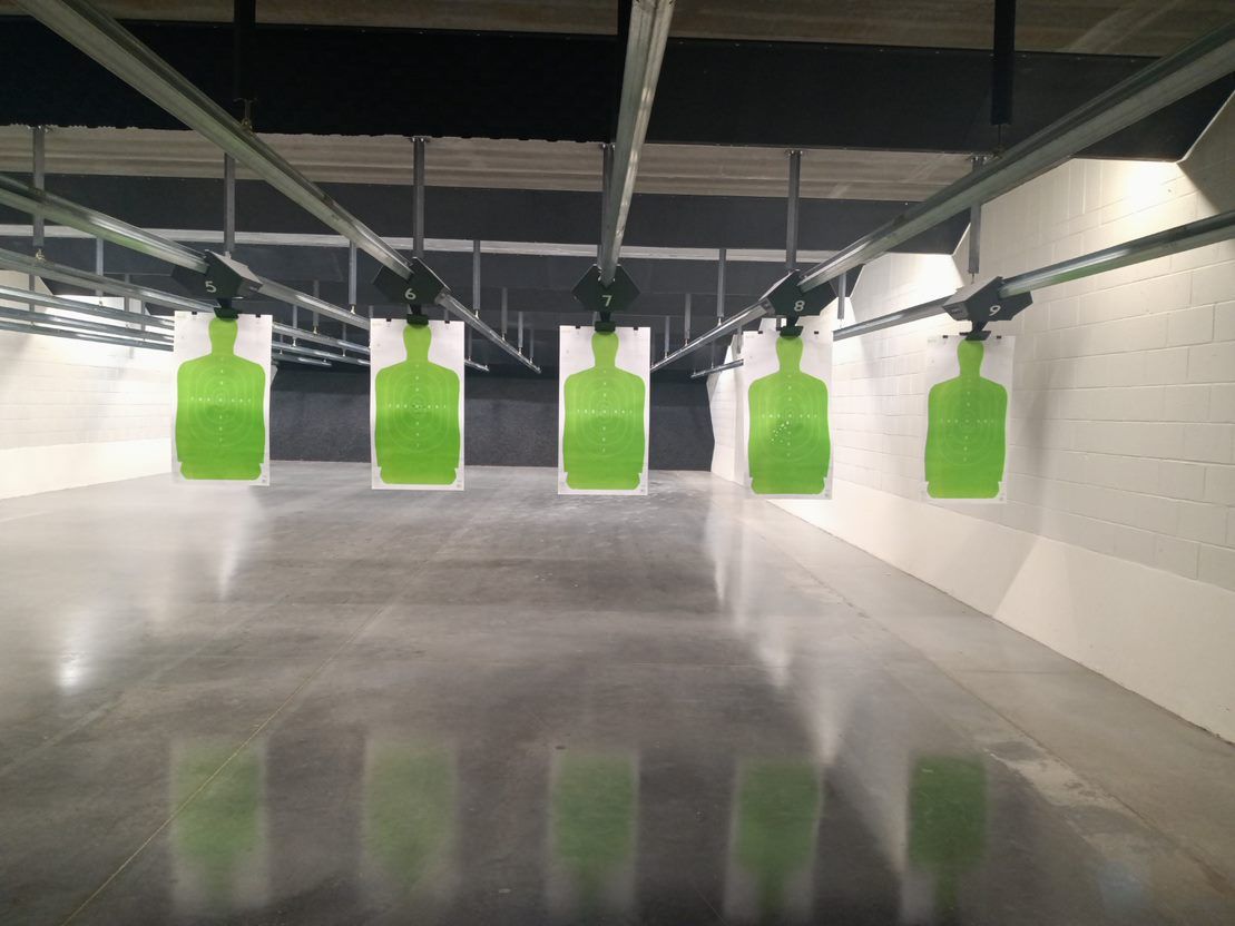 Indoor lanes with green targets
