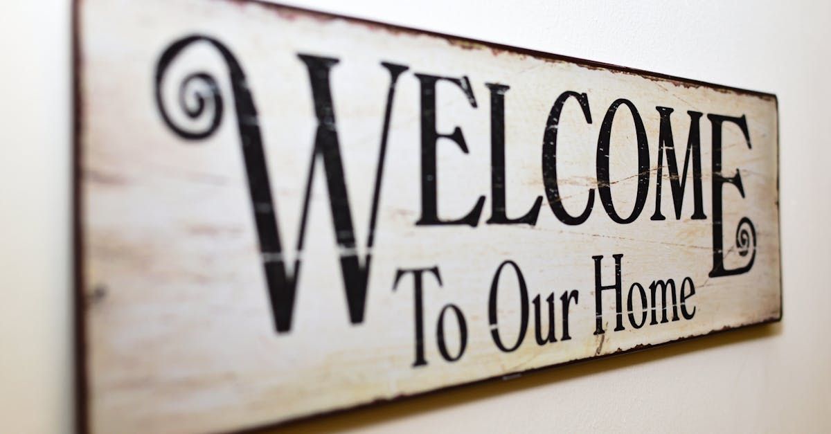 A sign that says welcome to our home on it