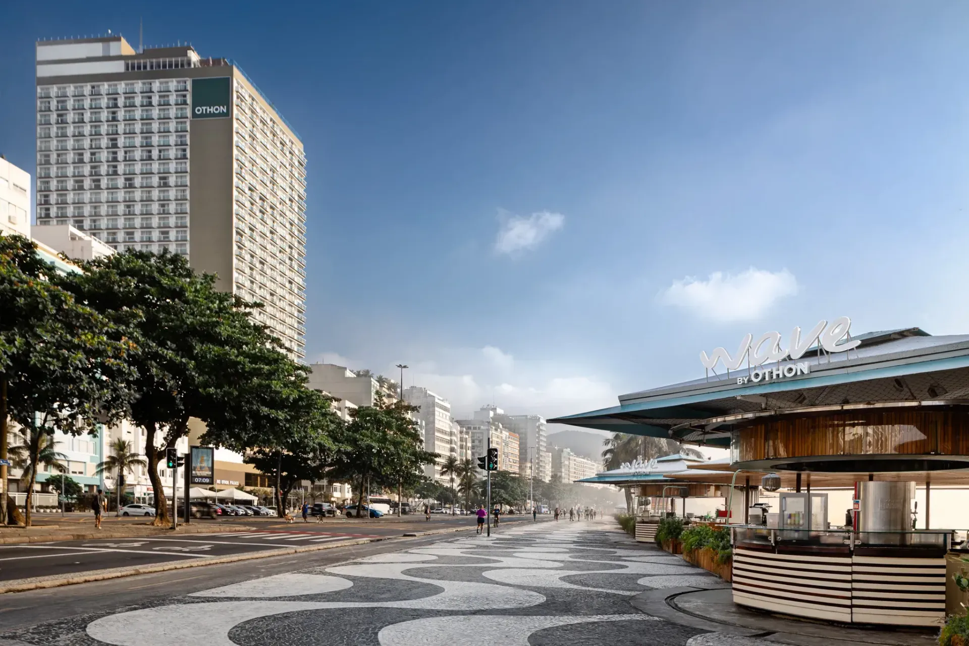 Avenida Atlântica in Copacabana, Rio de Janeiro. Street with wave-patterned pavement, buildings, and clear sky.