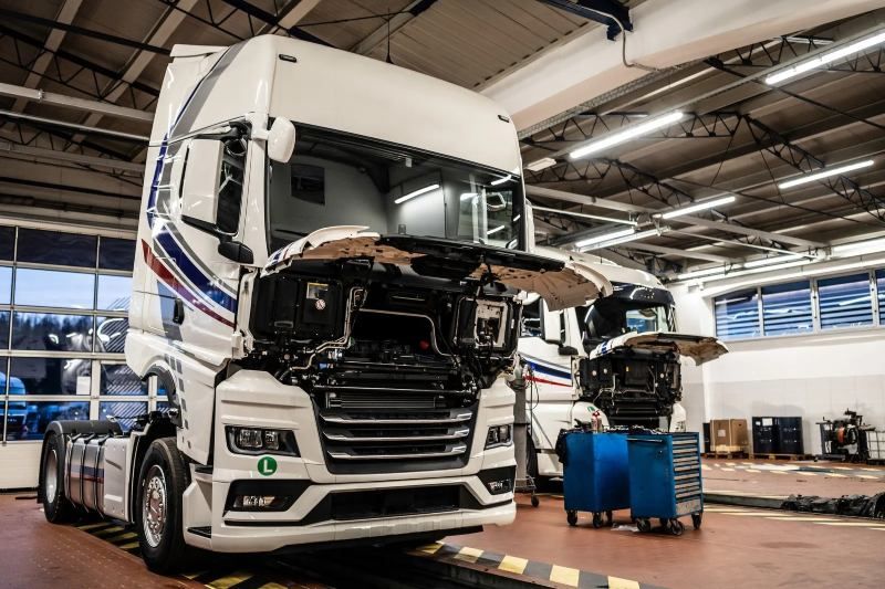 Commercial Trucks Undergoing Repair Inside a Fully Equipped Service Facility in St. Cloud, MN