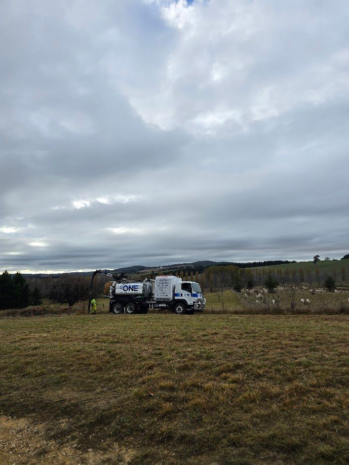 A Tanker Truck Parked in A Field — One Group Industries Pty Ltd in Bathurst, NSW