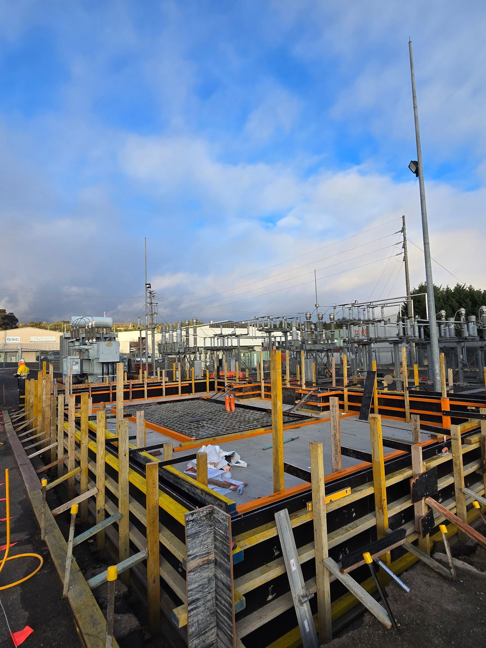 Construction site with wooden formwork for concrete foundation — One Group Industries Pty Ltd in Bathurst, NSW