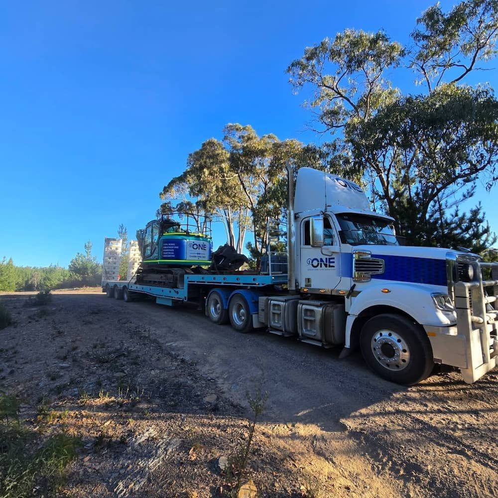 A Semi Truck With the Word Done on the Side — One Group Industries Pty Ltd in Bathurst, NSW
