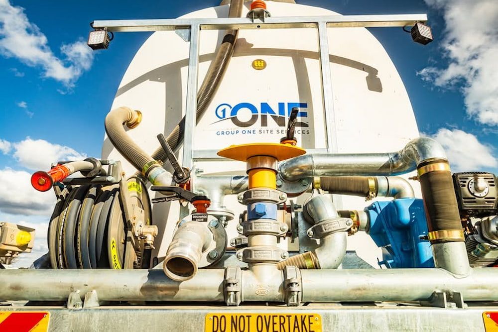 The Back of a Tanker Truck With a Do Not Overtake Sign on the Side — One Group Industries Pty Ltd in Bathurst, NSW
