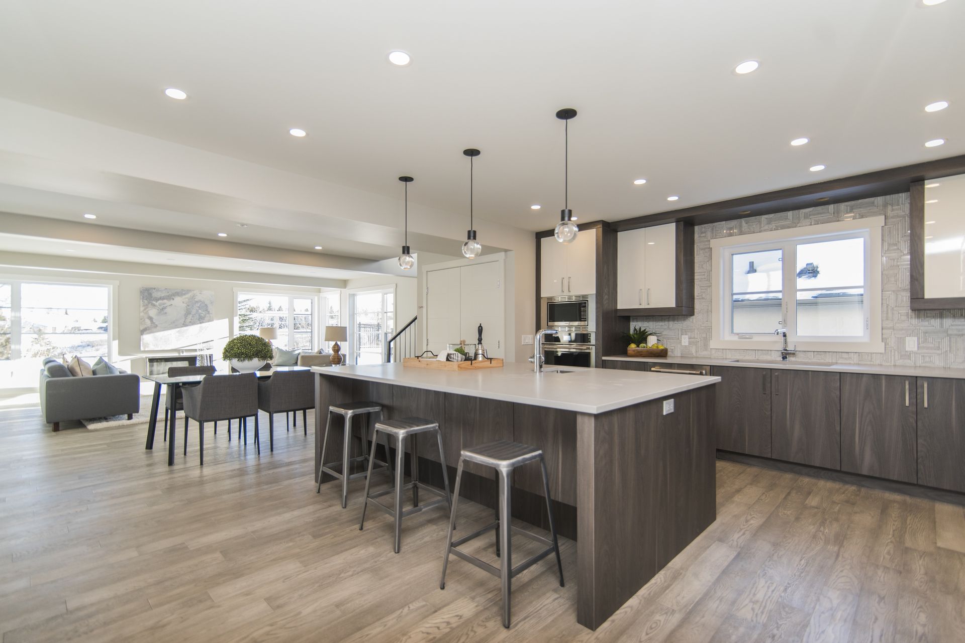 There is a large island in the middle of the kitchen.