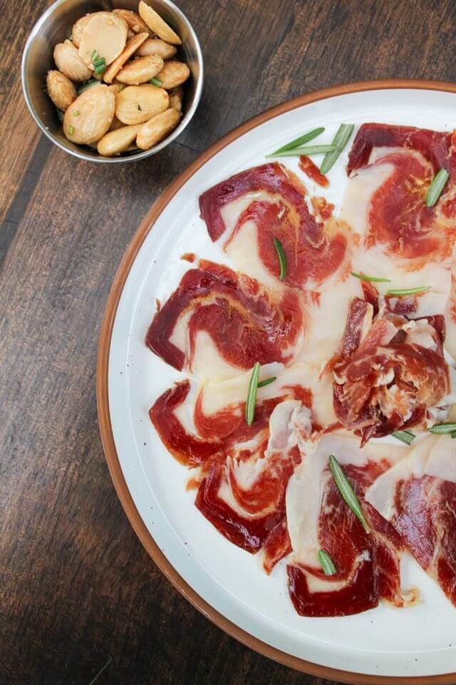 Jamon Iberico with rosemary and marcona almonds at Dahlia Tapas