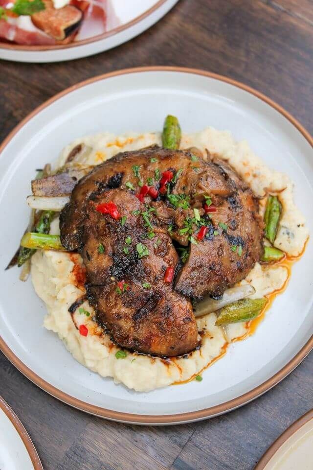 Grilled Portobello Mushroom Over Butter Bean and Charred Veggies