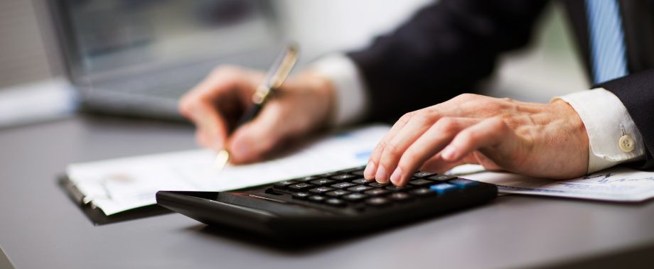 Calculator & Hands — Marion, Ohio — Ditmars & Associates CPA