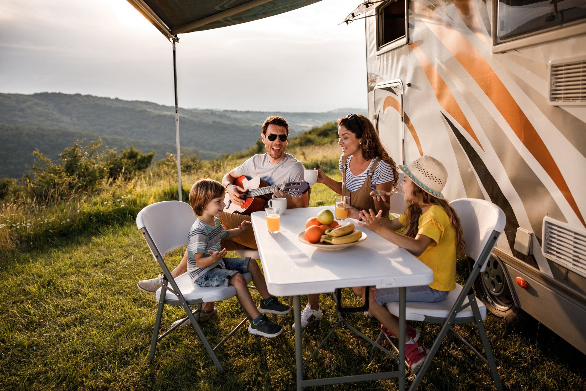 Happy Family Outside RV — Davis, OK — KV Mobile RV Park Happy Family Outside RV — Davis, OK — KV Mobile RV Park