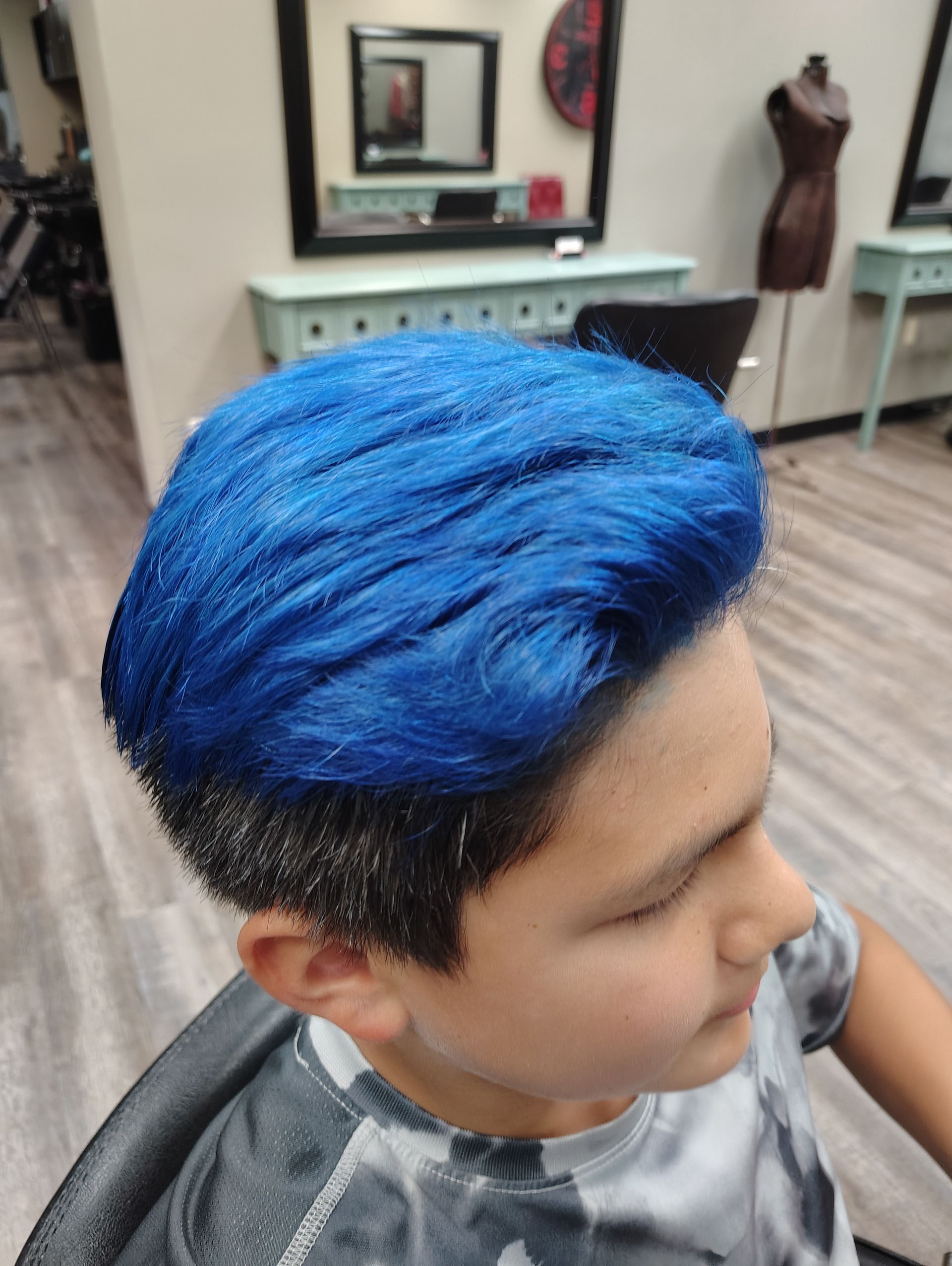 Boy with cobalt blue hair