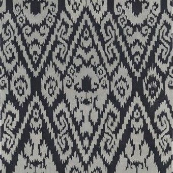 Black and gray geometric woven fabric pattern with repeating diamond and zigzag shapes