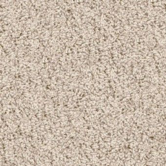 Close-up of beige textured carpet fibers