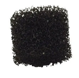 A close up of a black square sponge on a white background.