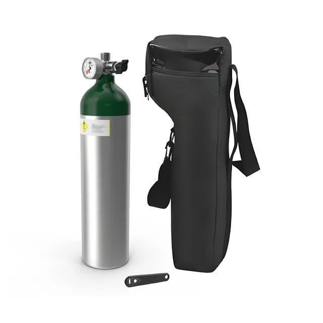 An oxygen cylinder is sitting next to a black bag.