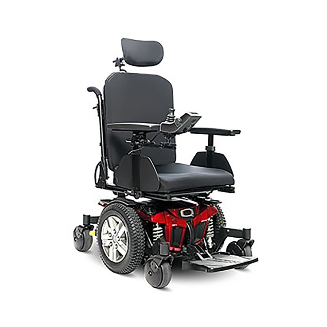 A red and black electric wheelchair on a white background.