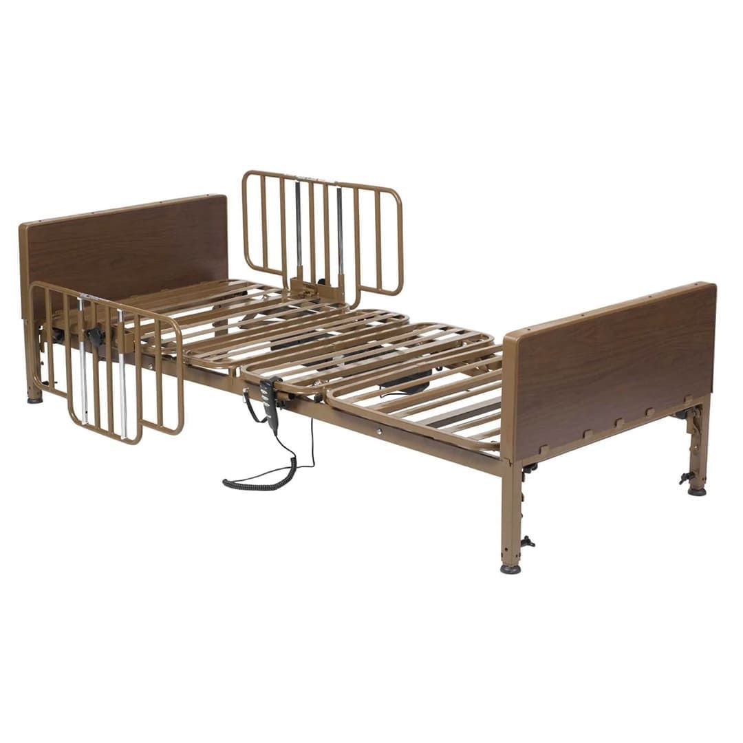An electric hospital bed with a wooden frame and rails on a white background.