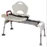 A white bench with a chair on top of it.
