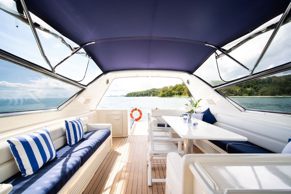 A Yacht Interior With Blue and White Cushions — Cupitt's Quality Upholstery in Rous, NSW