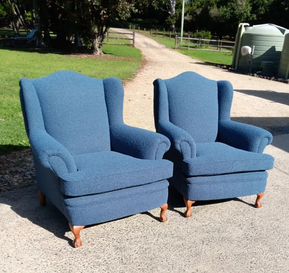 A Two Blue Upholstered Wingback Chairs, Outdoors on Concrete — Cupitt's Quality Upholstery in Rous, NSW