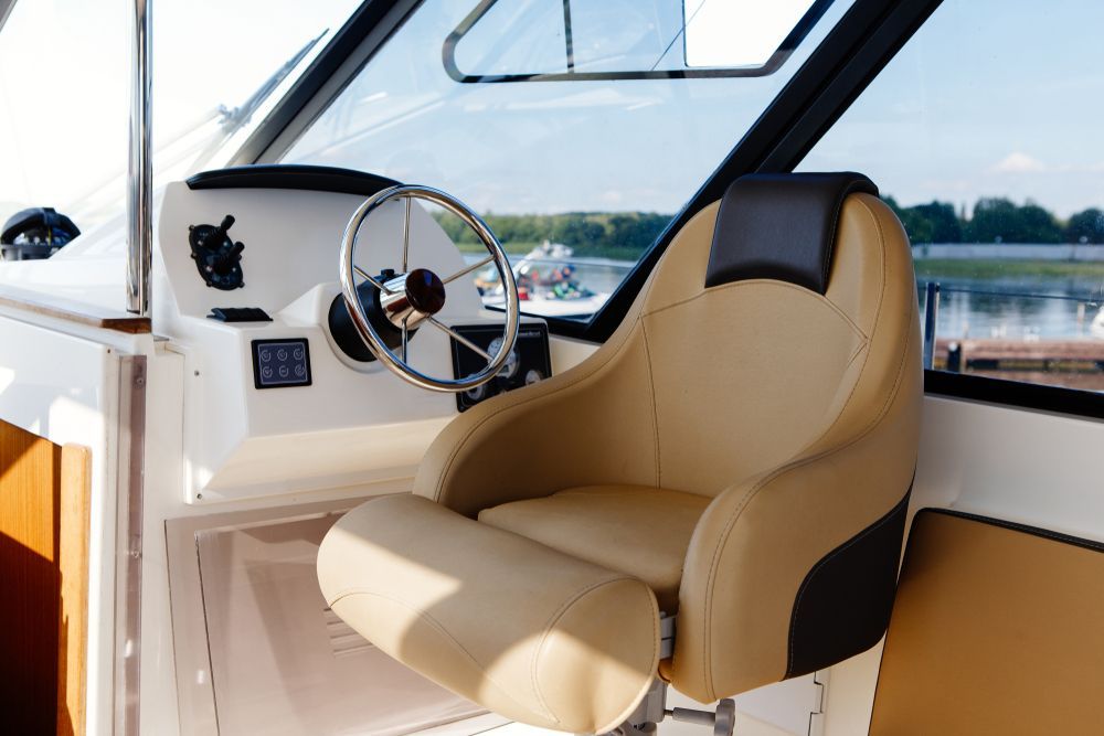 A Boat Helm With Tan Seat — Cupitt's Quality Upholstery in Byron Bay, NSW