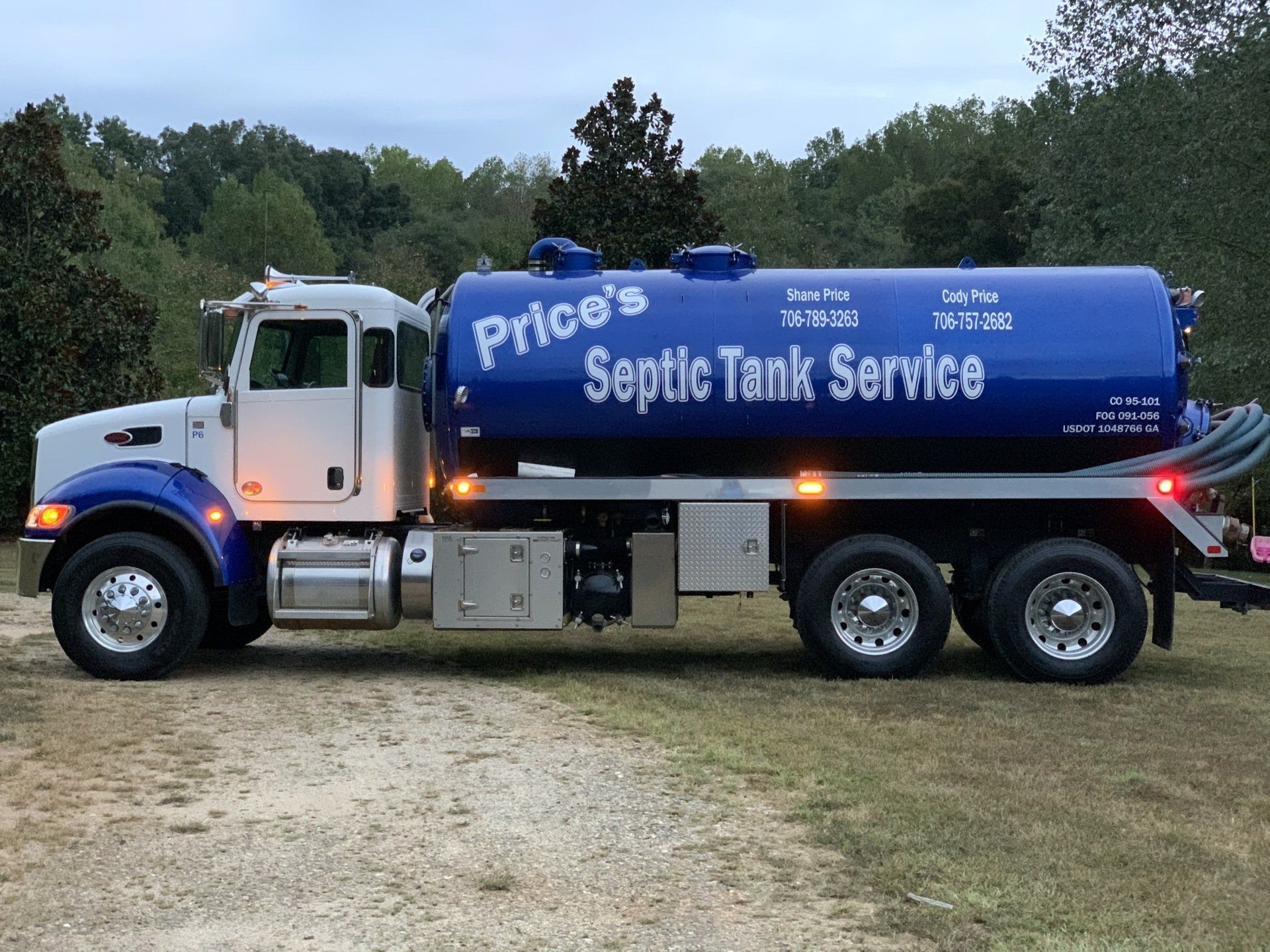 A Price Septic Tank Service truck. A Price Septic Tank Service truck.