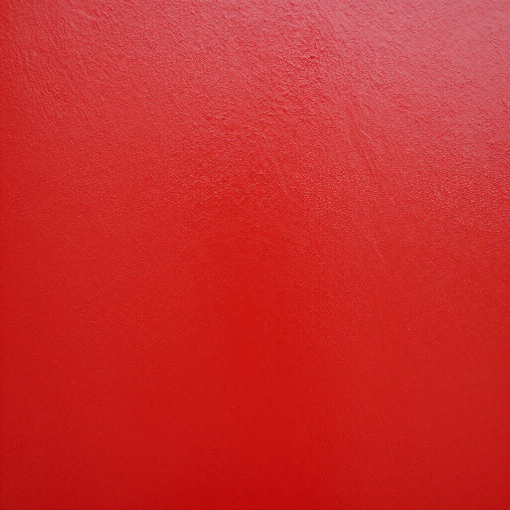 Superficie astratta rossa con texture e una sfumatura graduale che va dal rosso più scuro in alto al rosso più chiaro in basso.