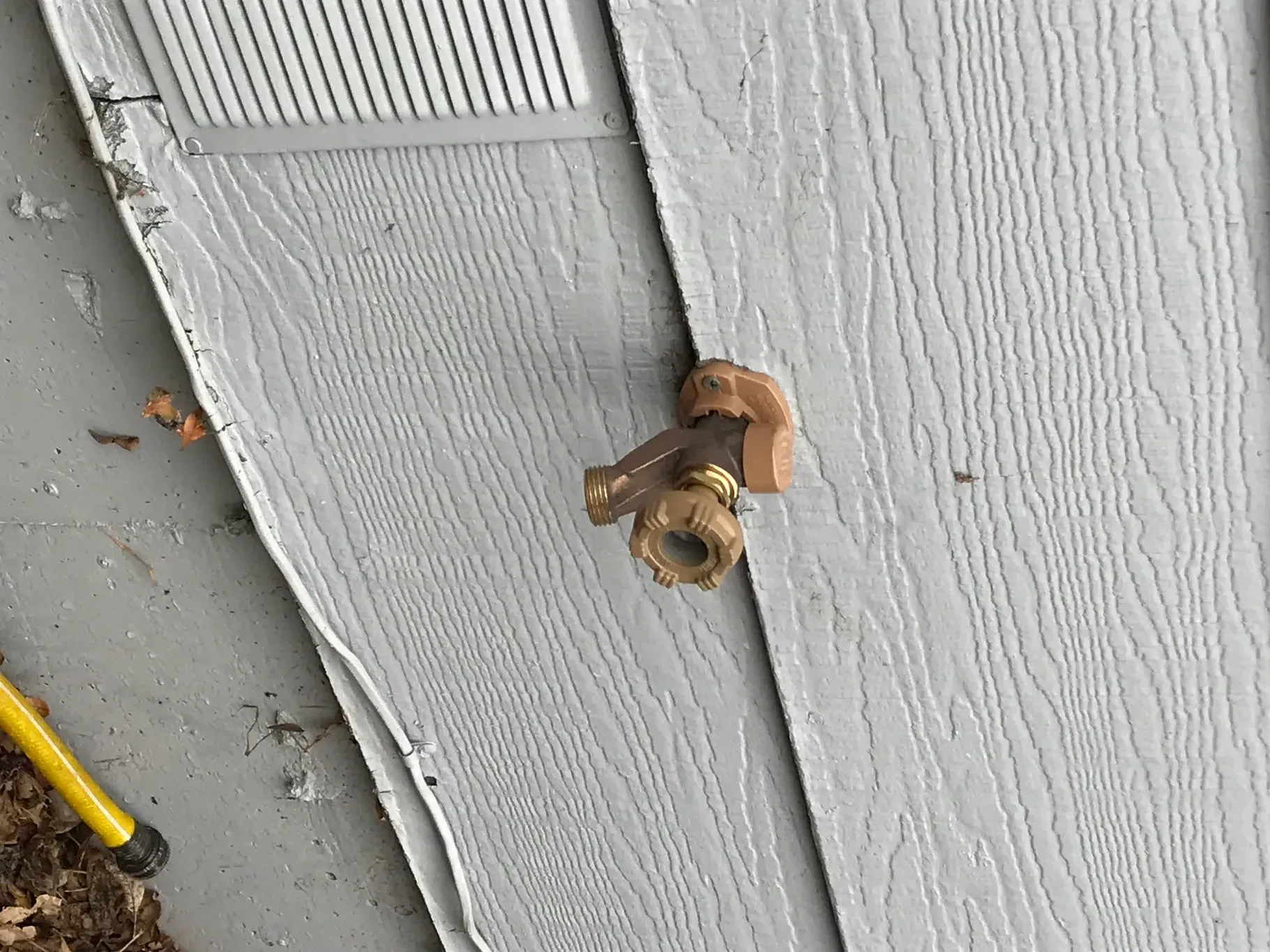 A close up of a door with a hole in it.