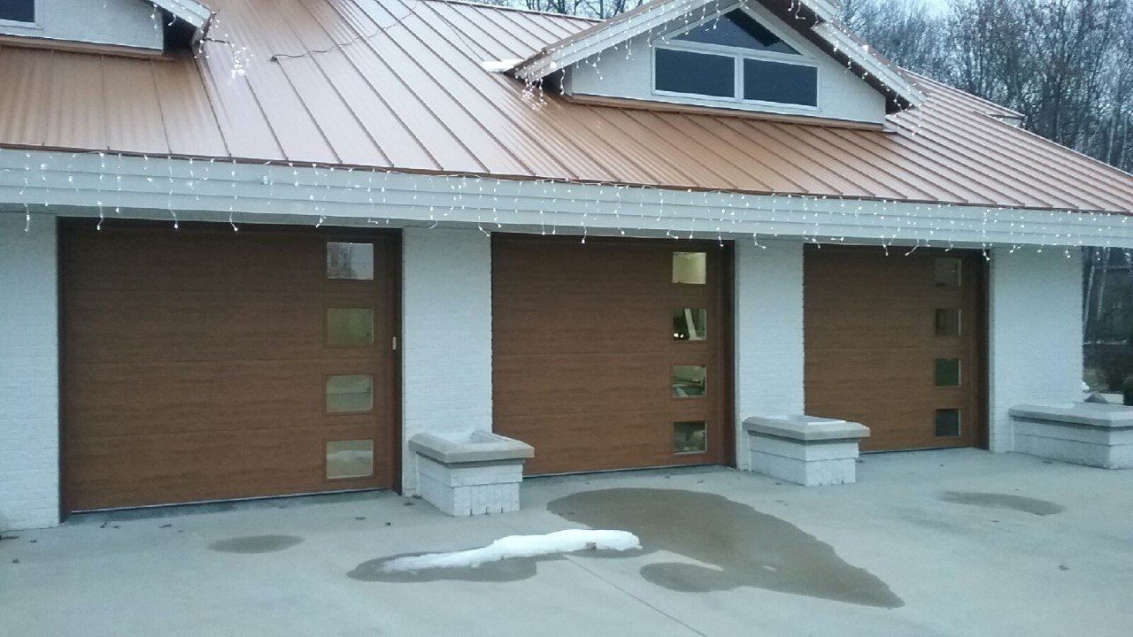 Three Wooden Brown Garage Door - Bay City, MI - M & R Garage Doors & Openers