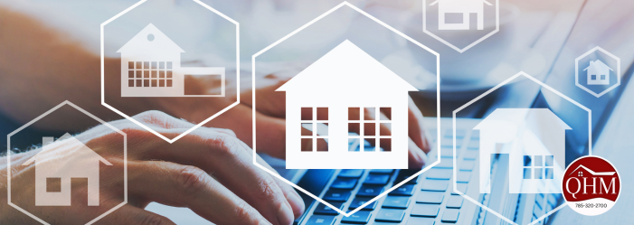 man typing on computer with pictures of properties floating on top