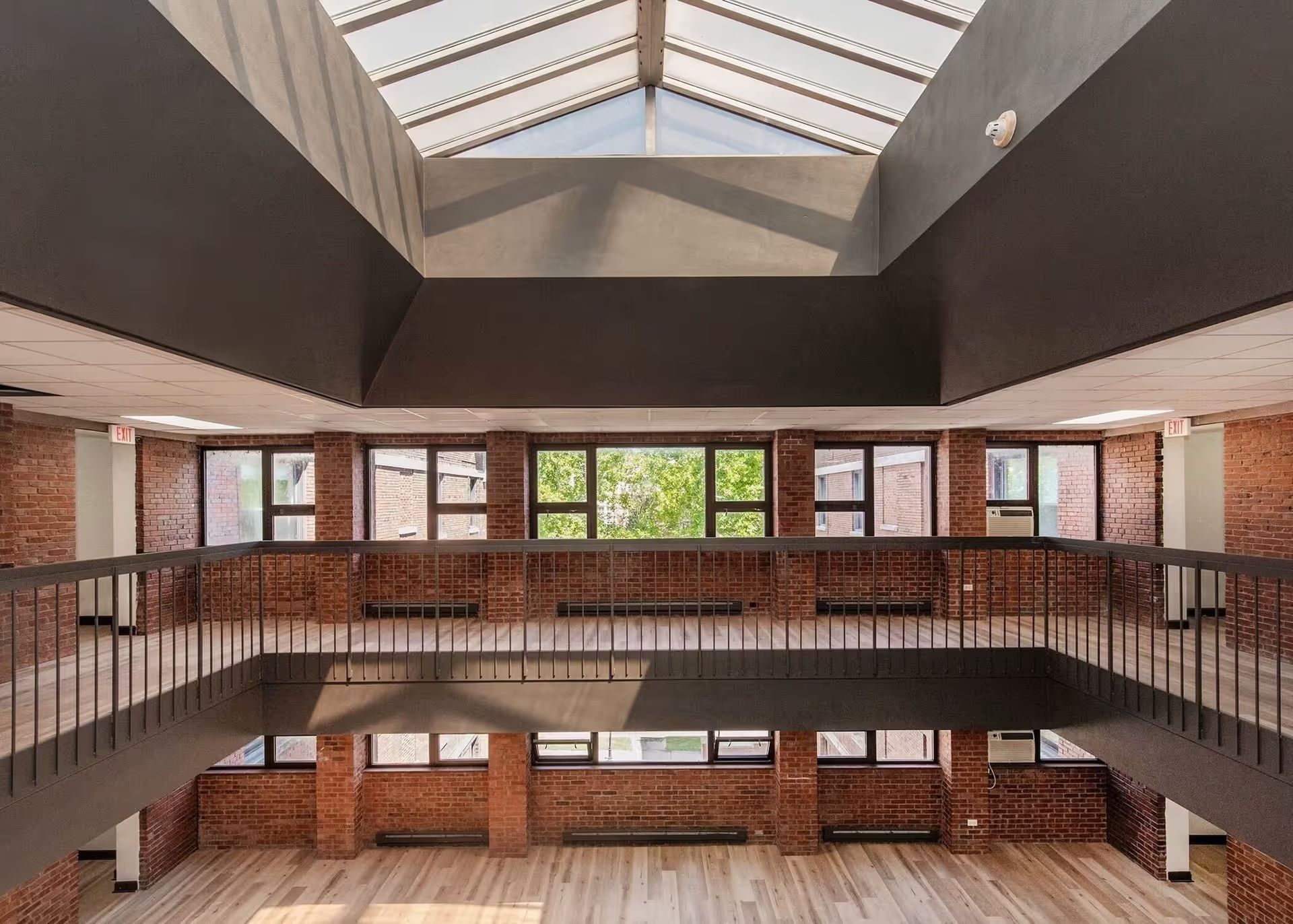 An artist 's impression of an empty building with a skylight
