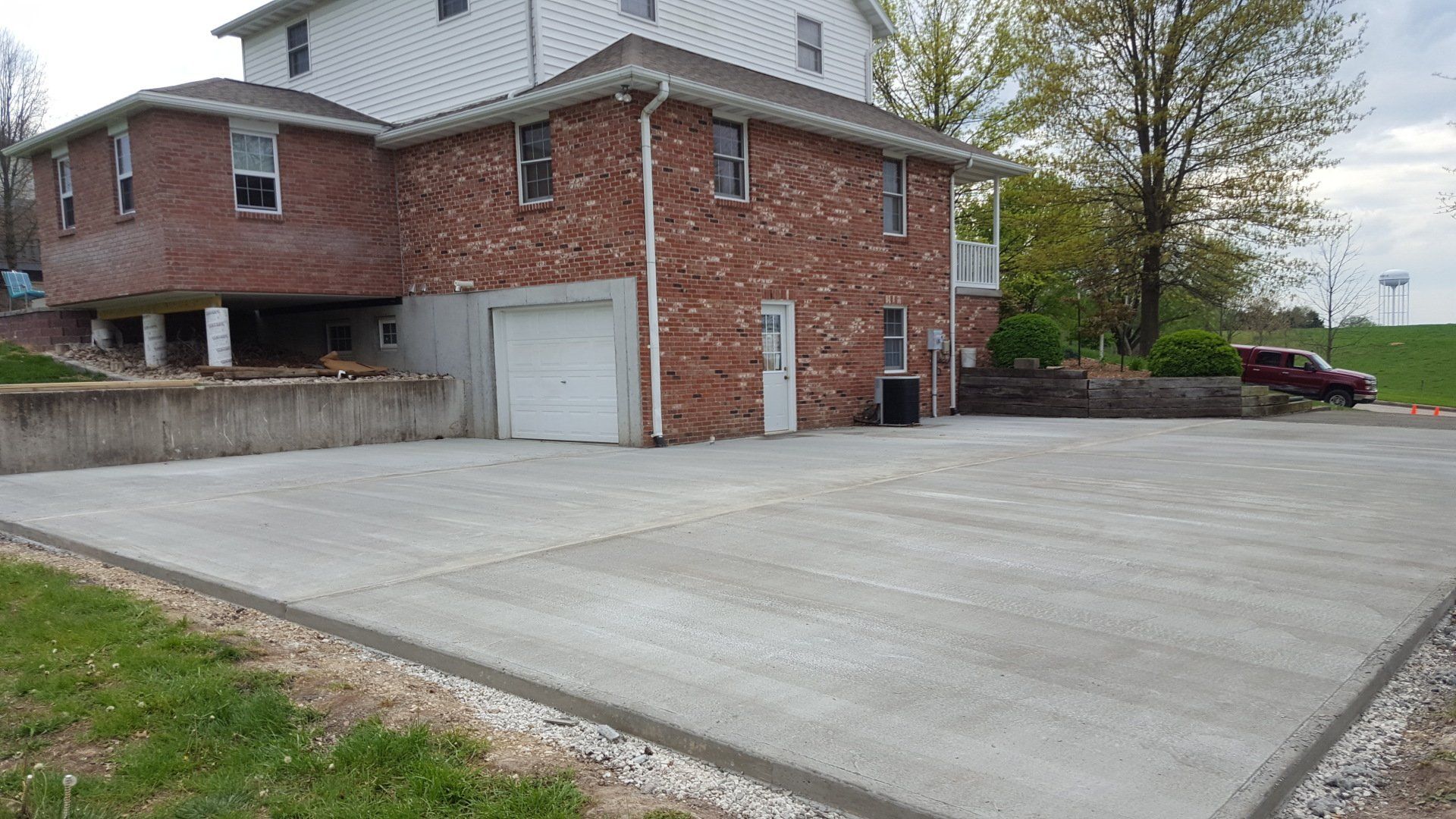 Asphalt Removal to Concrete Driveway
