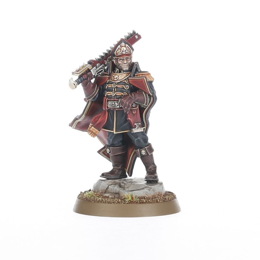 Two painted miniatures: a red-clad rifleman and a green backpacked figure on a small base