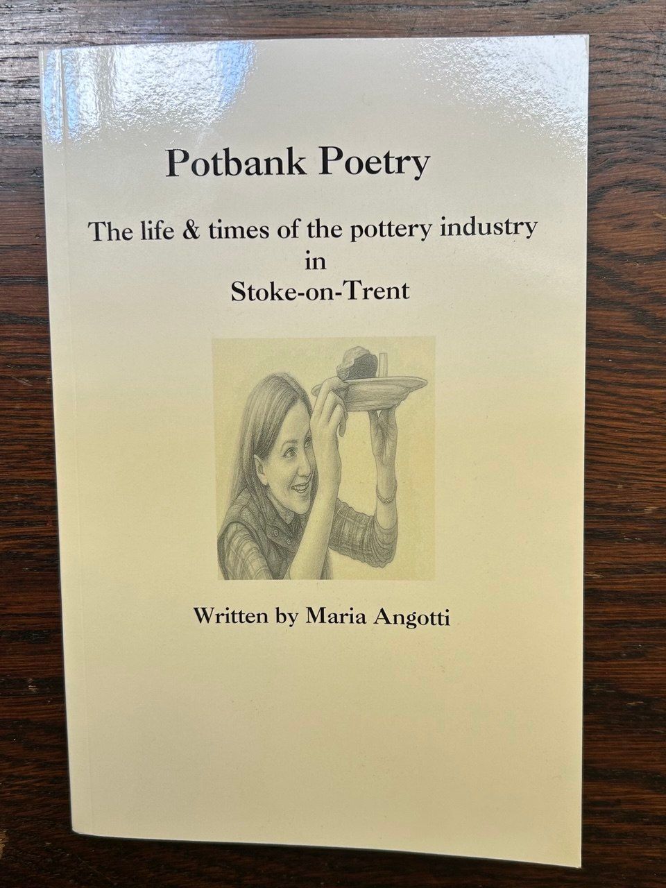 Book cover titled “Poetbank Poetry” with a small sepia illustration on a cream background.