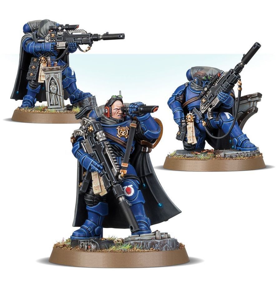 Warhammer 40,000 Primaris Eliminators boxed miniatures set with blue armored figures against an orange battlefield scene