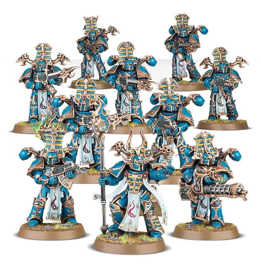 Warhammer 40,000 tabletop game box with blue-armored figures and teal-purple artwork