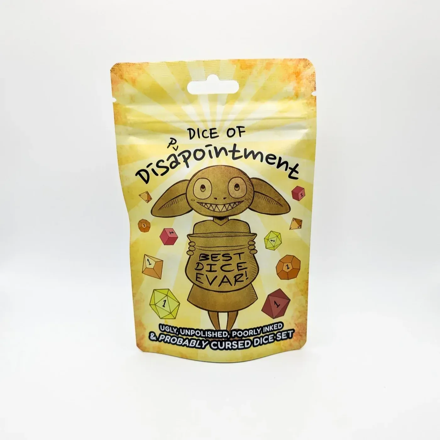 “Dice of Disappointment” novelty package with a cartoon turtle on a yellow-orange pouch.
