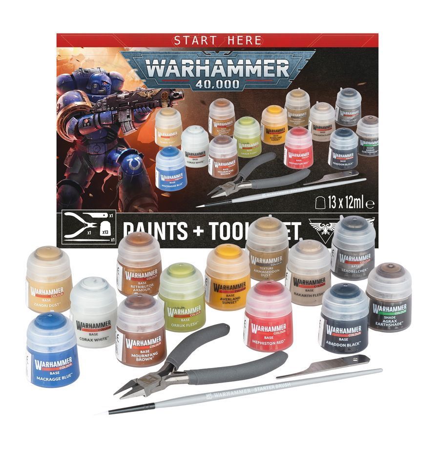 Warhammer 40,000 paint set with multiple paint pots, tools, and starter box packaging