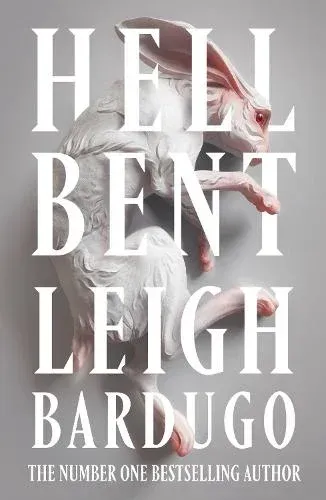 Book cover for H. B. Leigh Bardugo with a white wolf and red accents on a gray background