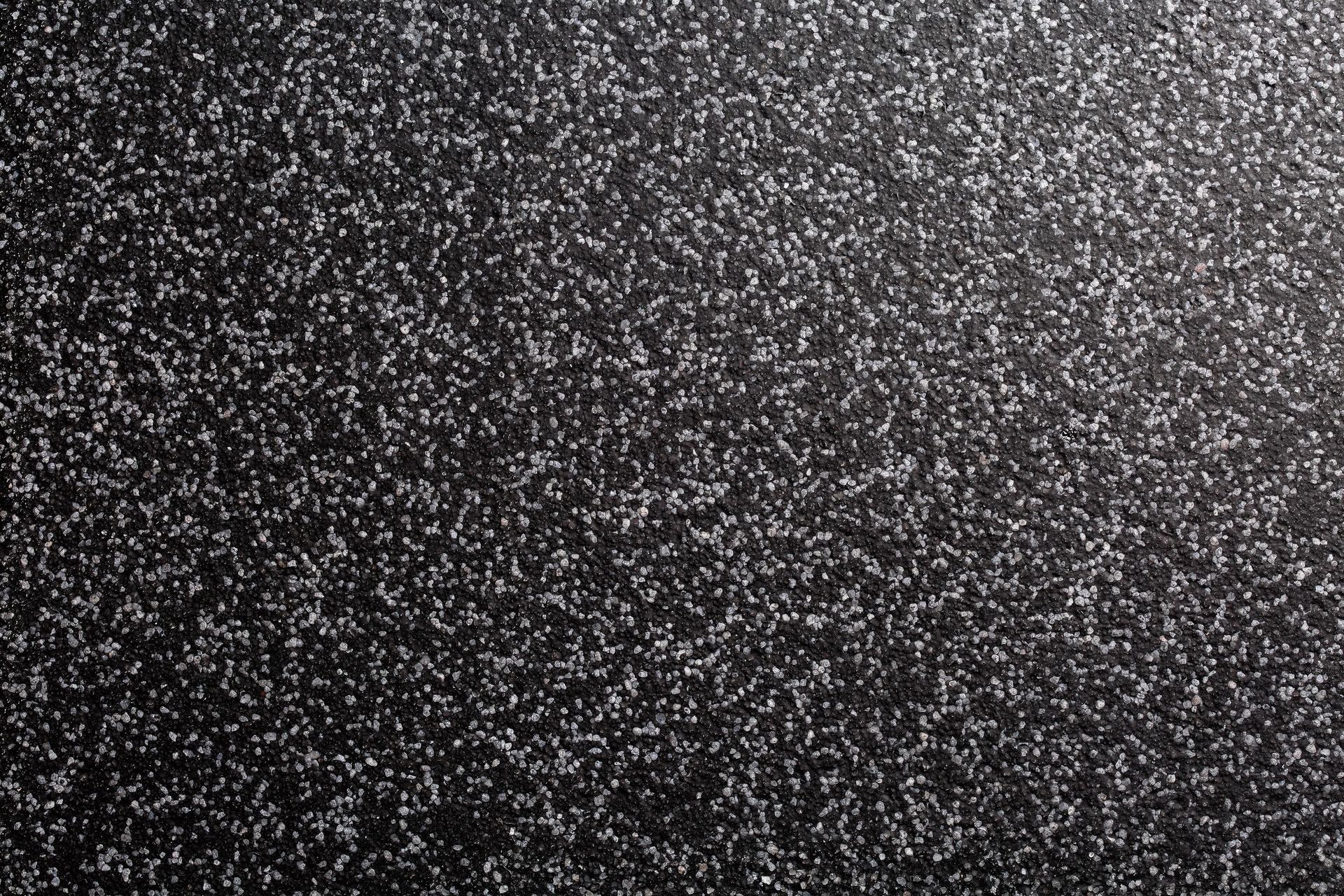 Black background with white speckles. Black background with white speckles.
