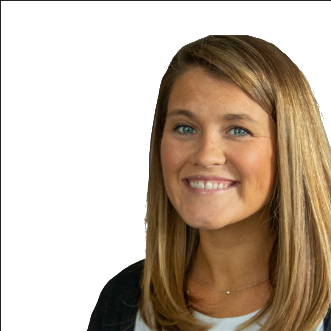 A woman with long brown hair is smiling for the camera