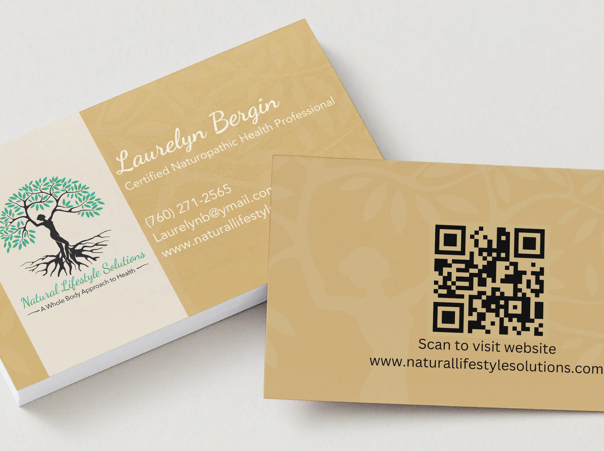 Business cards, tan and white, with logo of a tree. One card shows contact info. The other has a QR code.