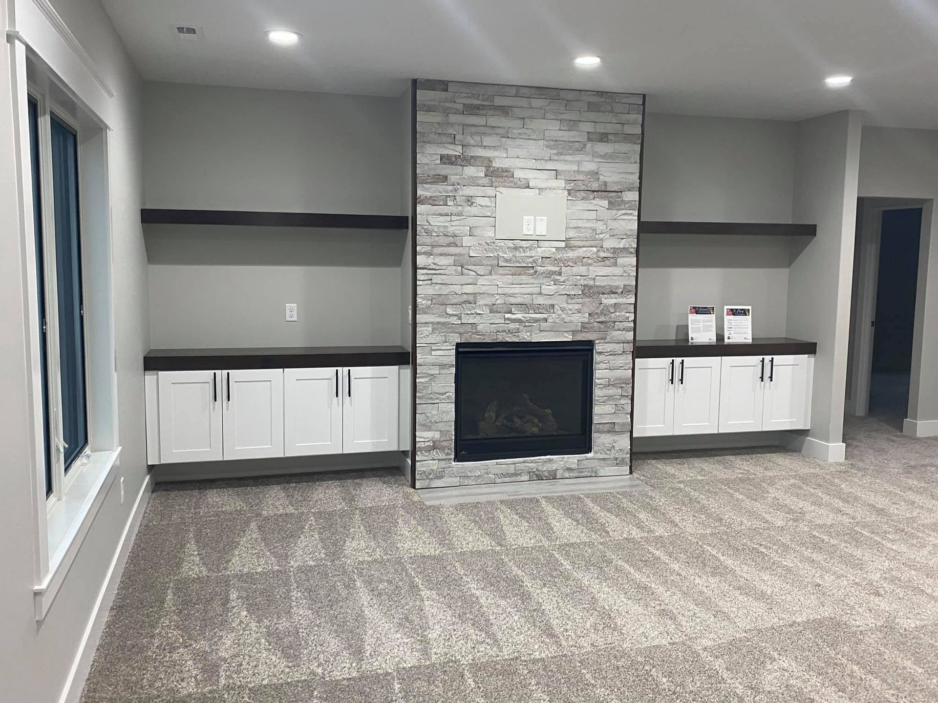 There is a fireplace in the middle of the room.