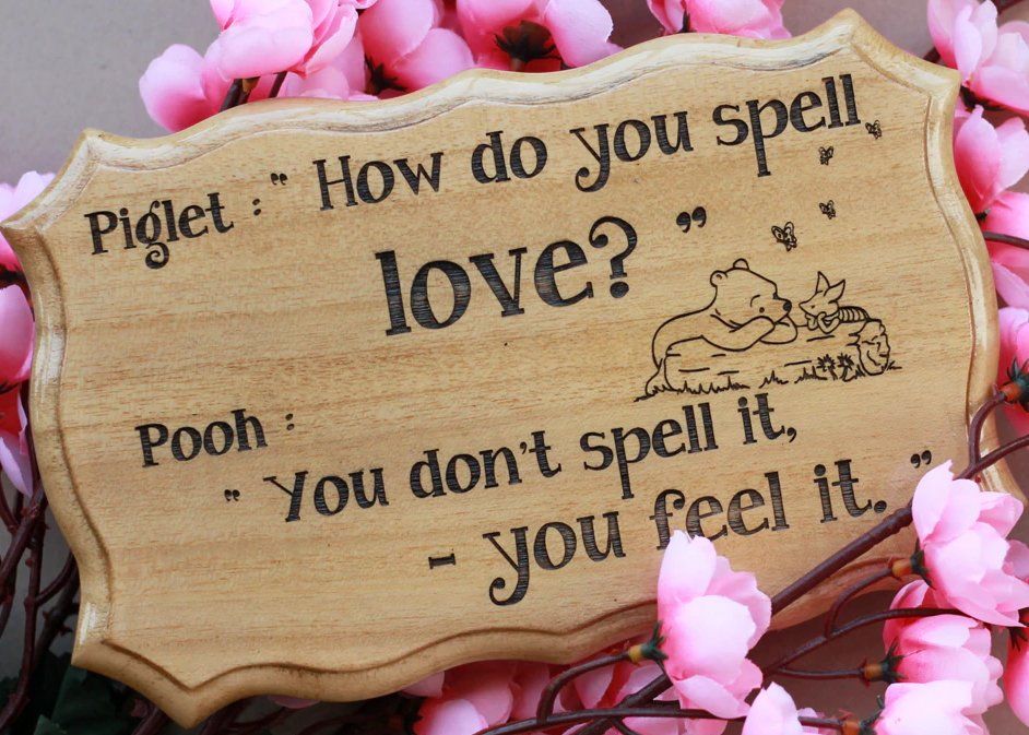 Wooden plaque with a Winnie the Pooh quote: 