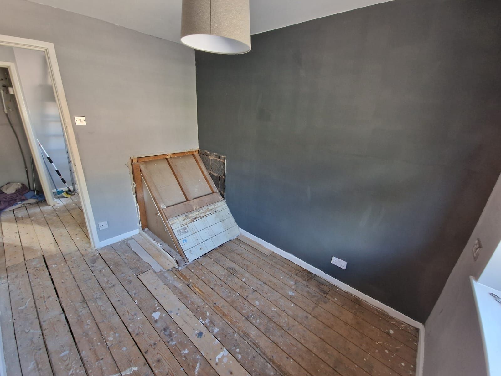 Bespoke bed in a boxroom with stair bulkhead