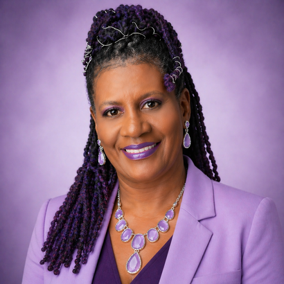Woman with purple hair and patterned dress, smiling.