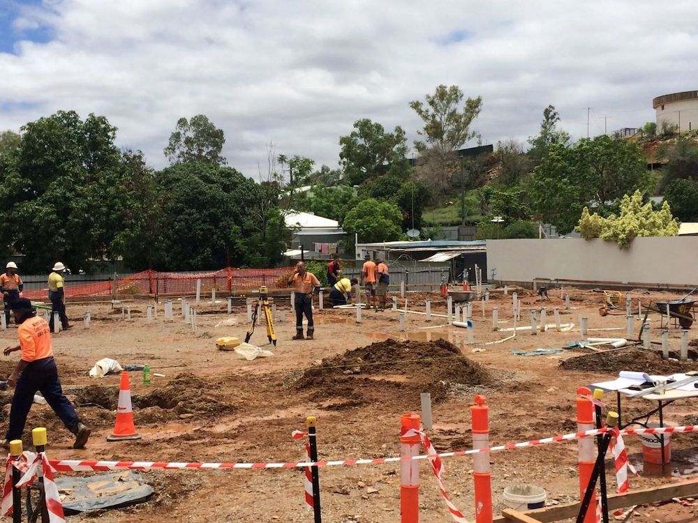 Construction Site With Workers in Orange Vests, Laying Foundation — Lamont Civil Services Pty Ltd In Townview, QLD