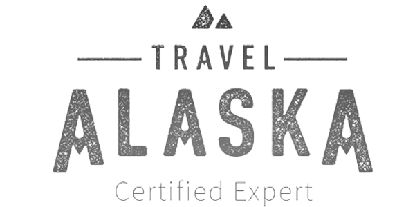 Travel Alaska logo, featuring textured text and mountain graphic, with