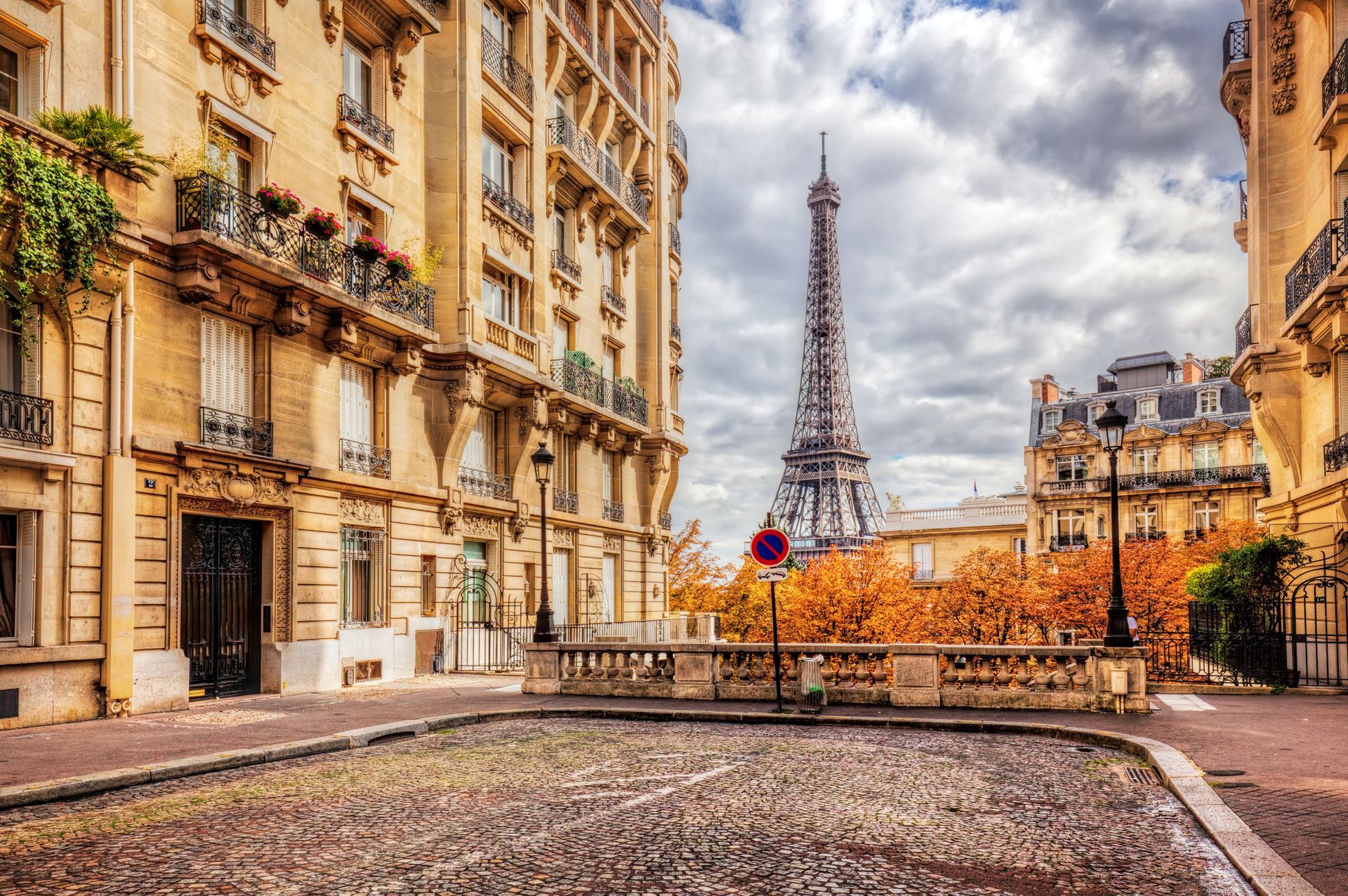 Paris cityscape with the Eiffel Tower at sunset — romantic France travel photography for luxury itineraries.