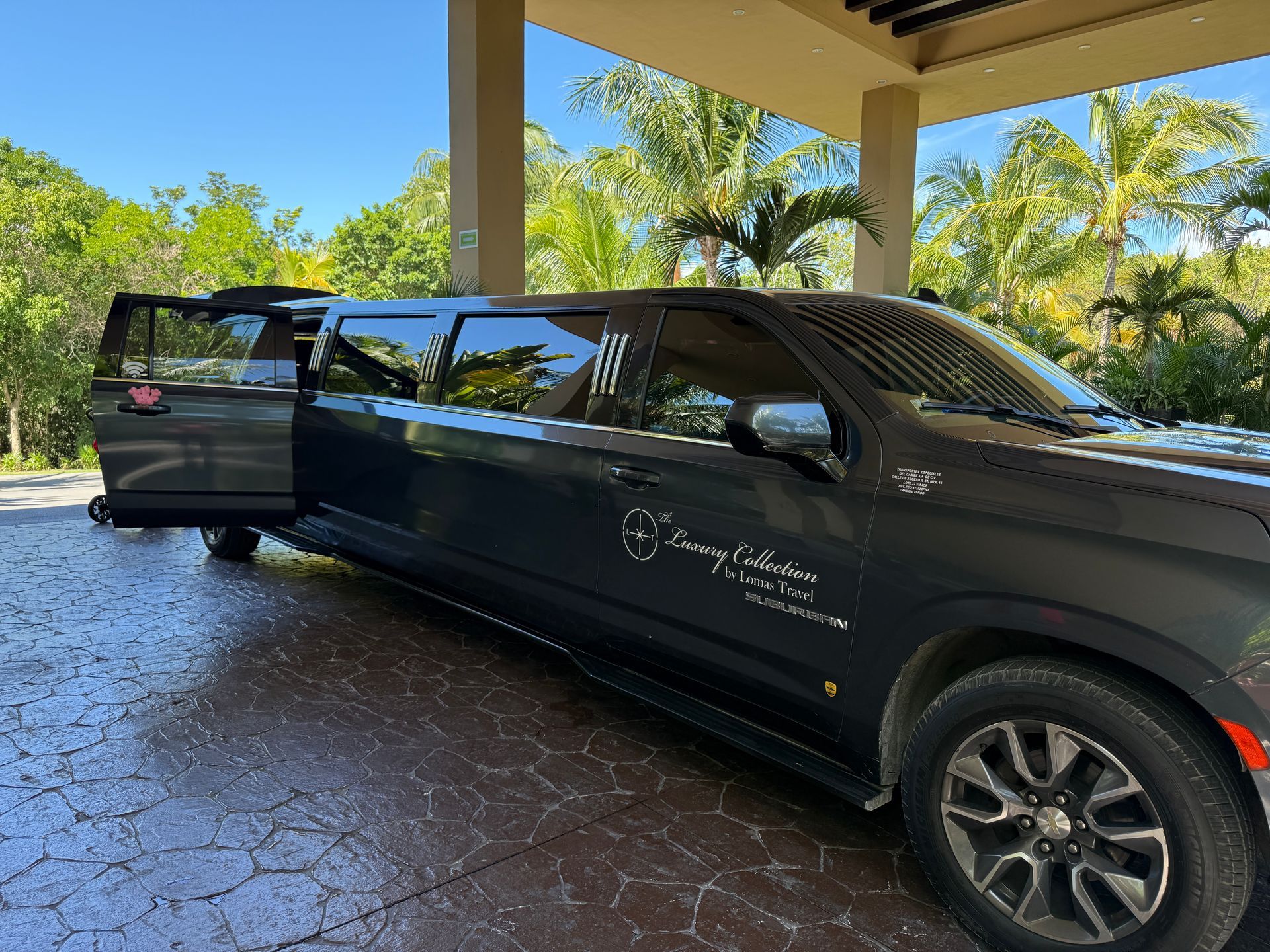Cora the plush buddy enjoys a stretch limo ride in Mexico, showing why resort transfers set the tone