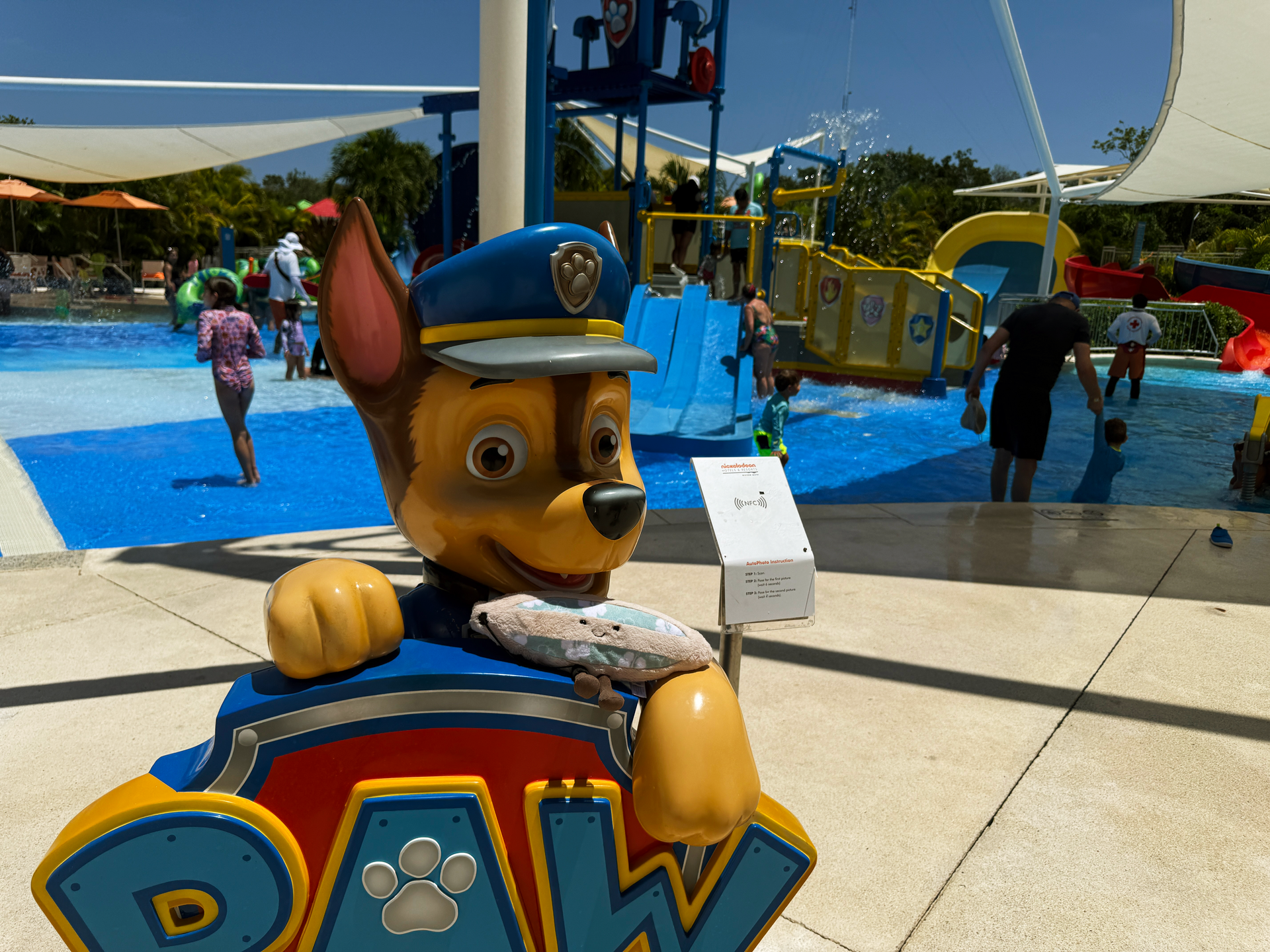 Paw Patrol splash pad Nickelodeon Riviera Maya toddler water play area with shallow pool and shaded